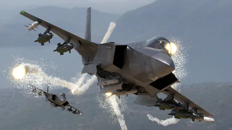 Avioane de vânătoare F-35 în zbor, cu lansări de rachete.