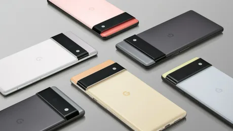 Telefoane Pixel 6 și 6 Pro, diverse culori, pe o suprafață netedă.