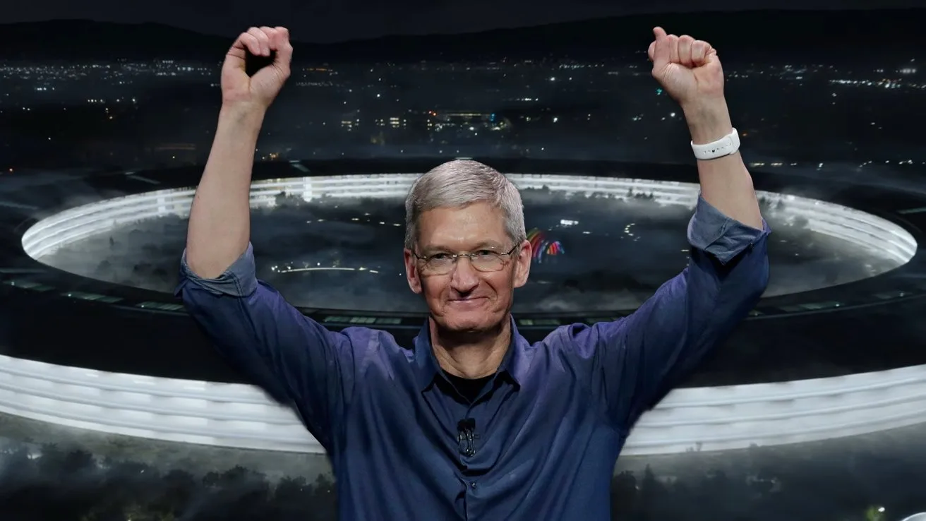 Tim Cook celebrând succesul Apple într-un moment de tranziție importantă.