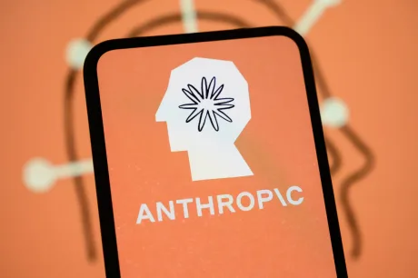 Logo-ul Anthropic pe un fundal portocaliu, simbolizând inovația în AI.