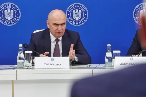 Ilie Bolojan discutând despre criza politică în România.