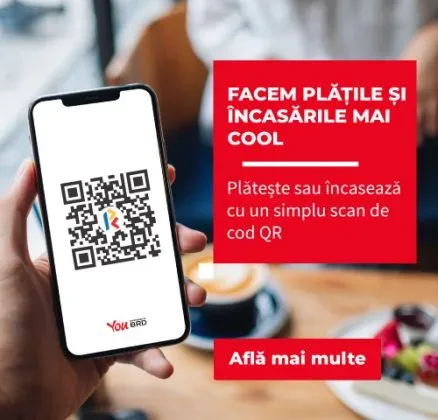 Un telefon mobil cu un cod QR pentru plăți rapide.