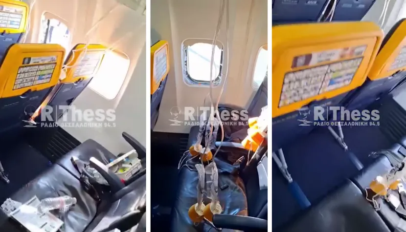 Interiorul aeronavei cu măști de oxigen căzute după depresurizare.