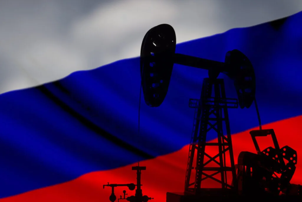 Flacăra simbolică a petrolului rusesc pe fundalul steagului Rusiei.