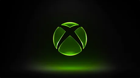 Logo-ul Xbox pe fundal negru, simbolizând brandul de console.