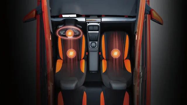 Interiorul modelului BYD Dolphin G DM-i cu scaune bicolore.