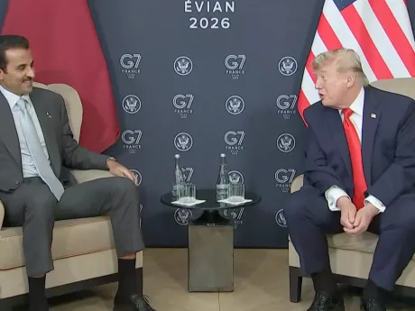Emirul Qatarului discutând cu Donald Trump la summitul G7 despre acordul cu Iranul.