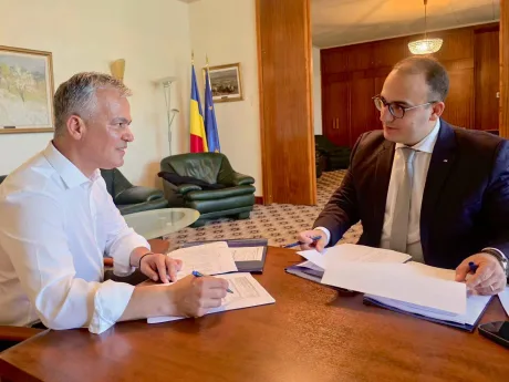 Adrian Veștea și Florin Zaharia discutând despre investiții și proiecte europene.