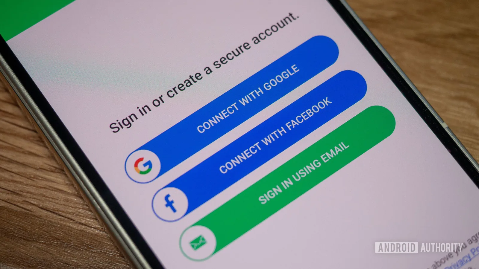 Ecran de autentificare cu opțiuni pentru Google și Facebook