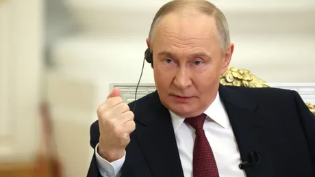 Vladimir Putin discutând despre intervenții militare în străinătate.