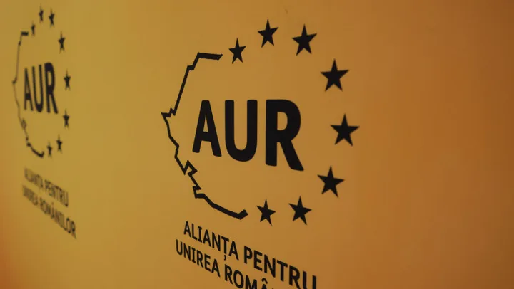 Logo-ul AUR pe un fundal galben, simbolizând alianța politică.
