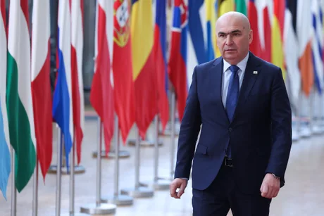 Premierul Bolojan discutând despre bugetul României și deficitul bugetar.