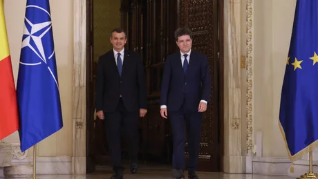 Eugen Tomac și Nicușor Dan la ceremonia de desemnare a noului prim-ministru.