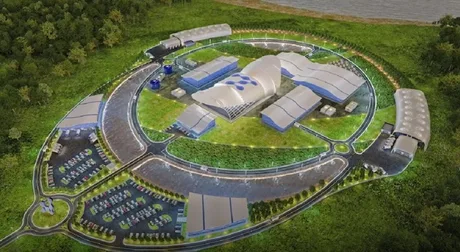 Viziune artistică a proiectului de centrală SMR din Idaho, cu clădiri și infrastructură modernă.
