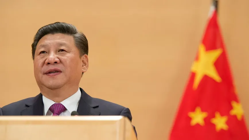 Lider chinez discutând despre reglementările comerciale recente.
