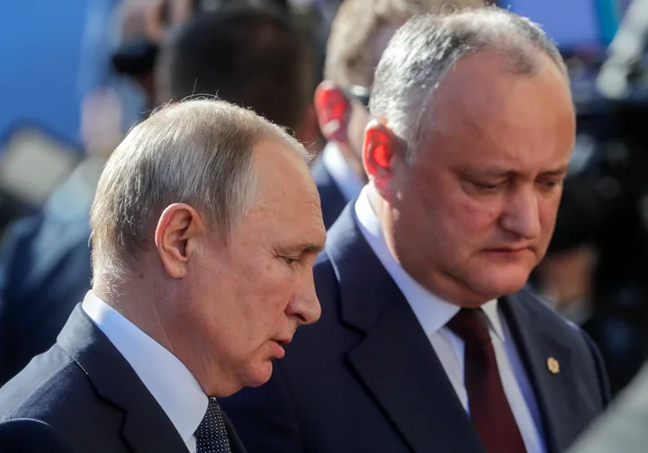 Igor Dodon și Vladimir Putin discutând la Moscova, în contextul relațiilor bilaterale.