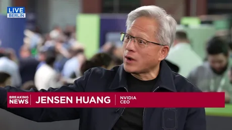 Jensen Huang discută despre controlul modelelor de inteligență artificială la un eveniment.