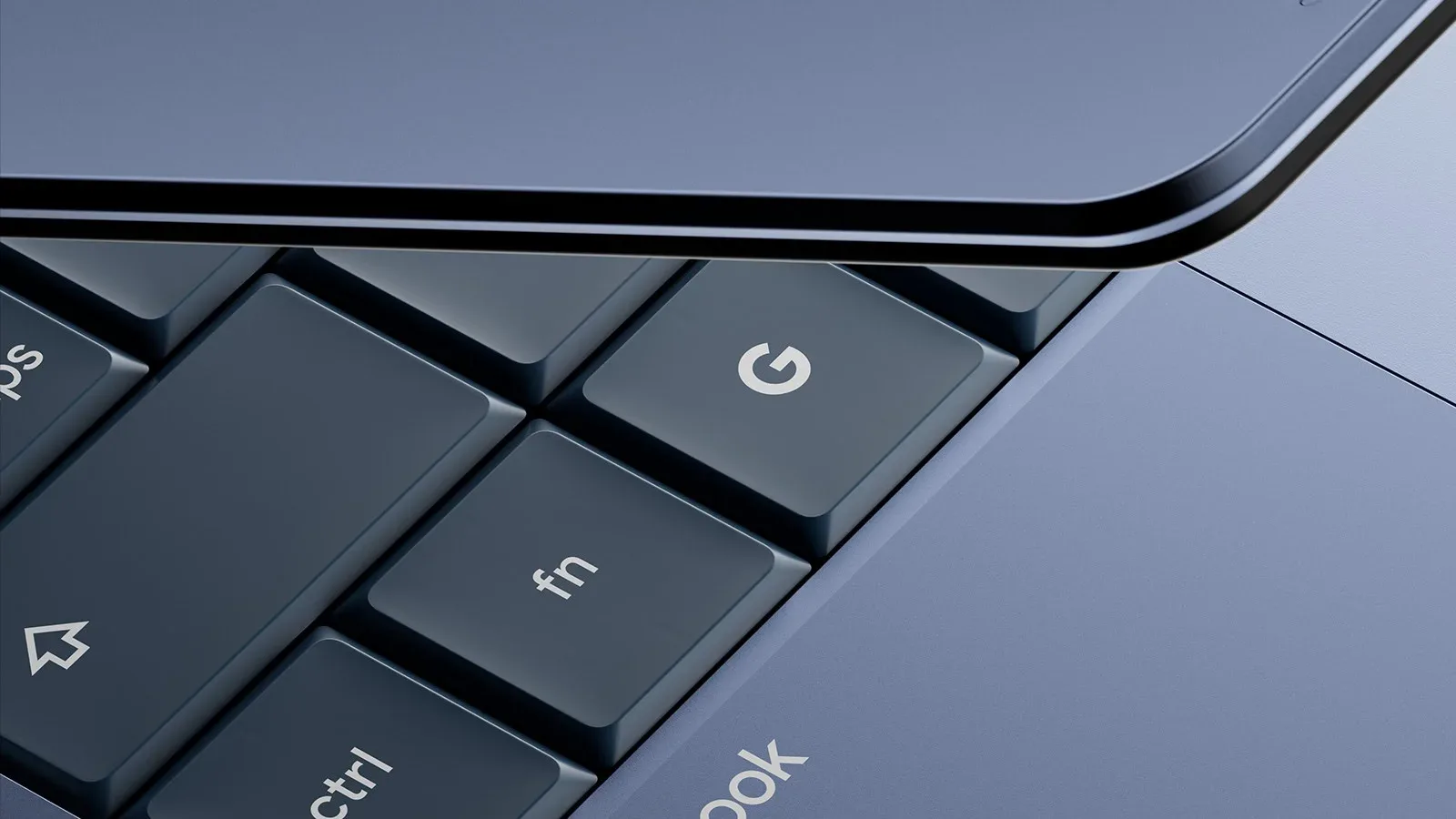 Detaliu al unui laptop cu tastatură, evidențiind litera G.