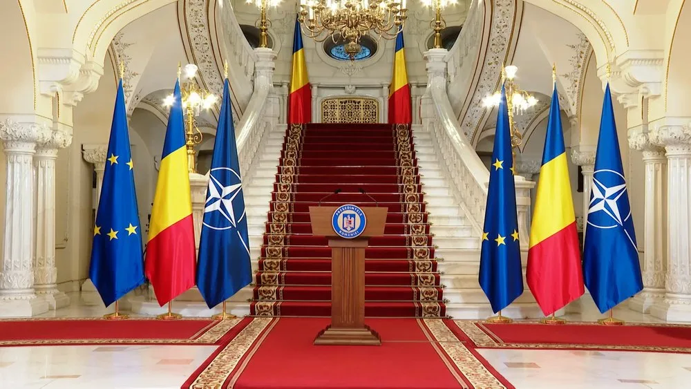 Scenă elegantă cu steaguri, simbolizând unitatea și stabilitatea României.