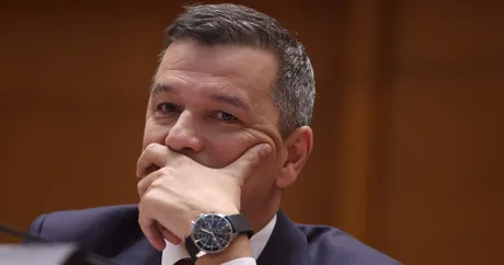 Sorin Grindeanu reflectând asupra unei situații tensionate legate de ancheta DNA.