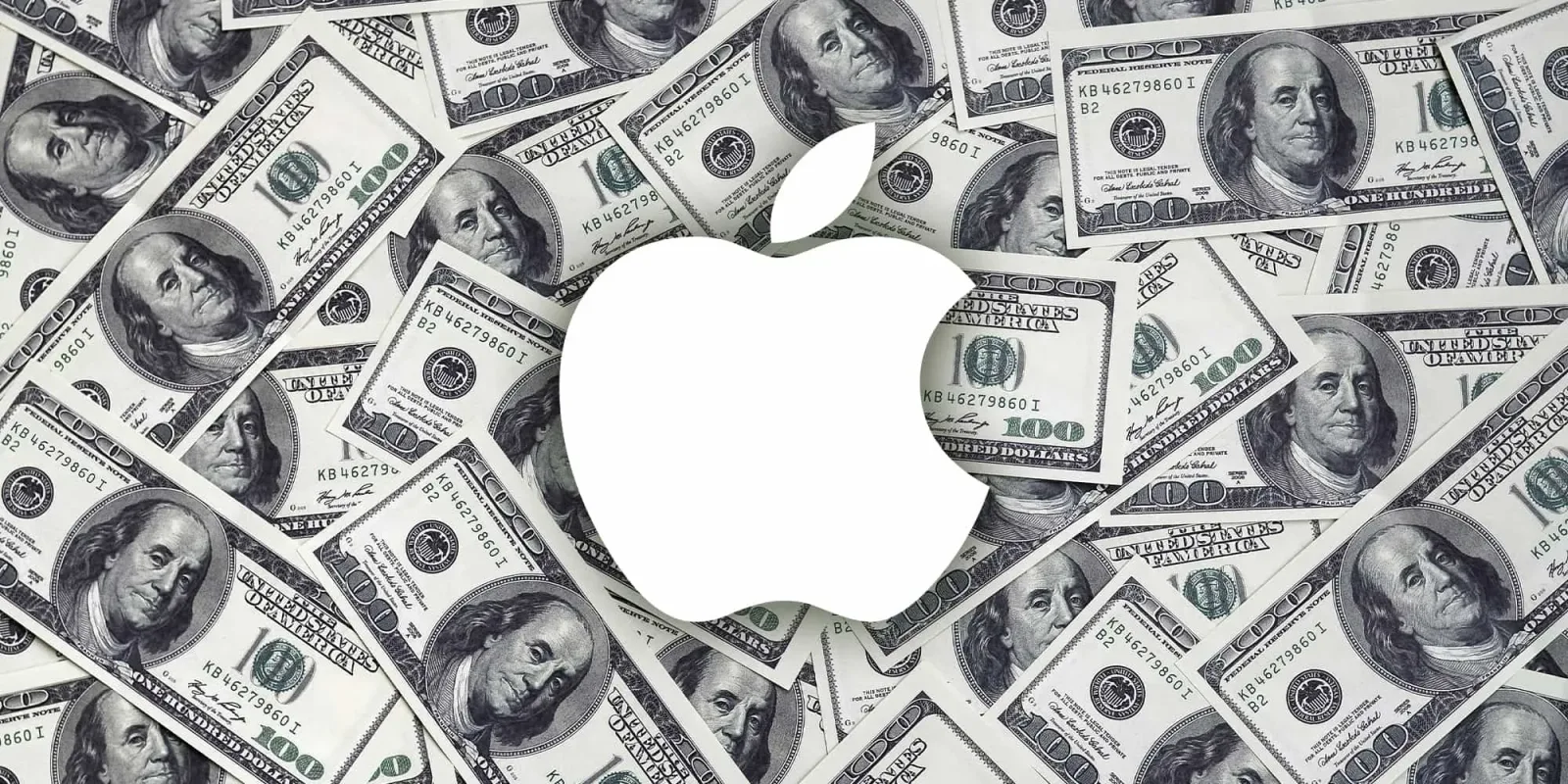 Logo Apple pe fundal de bancnote de dolari.
