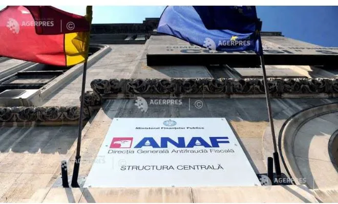 Sediul ANAF cu steagurile României și Uniunii Europene în față.