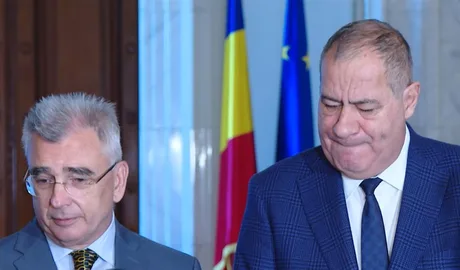 Reprezentanți ai PSD și AUR discutând despre moțiunea de cenzură.