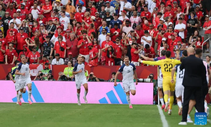 Suporteri canadieni sărbătoresc primul punct la Cupa Mondială FIFA.