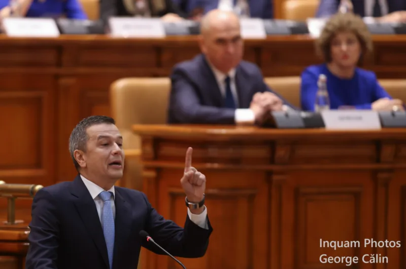 Ilie Bolojan vorbește în fața parlamentului despre acuzațiile primite.