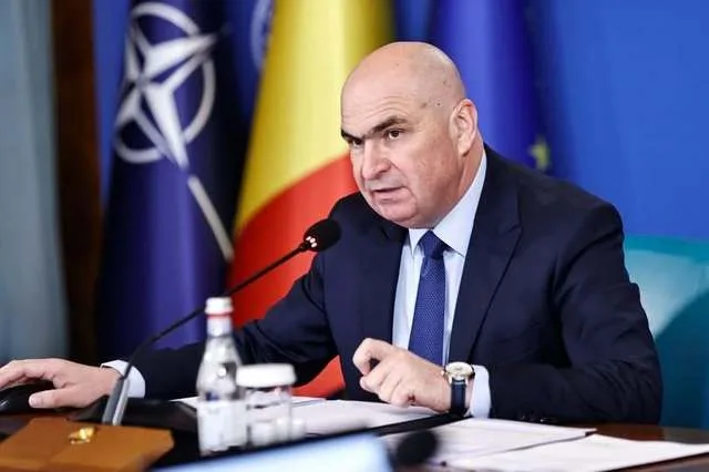 Ilie Bolojan discutând despre criza politică și bugetară în România.