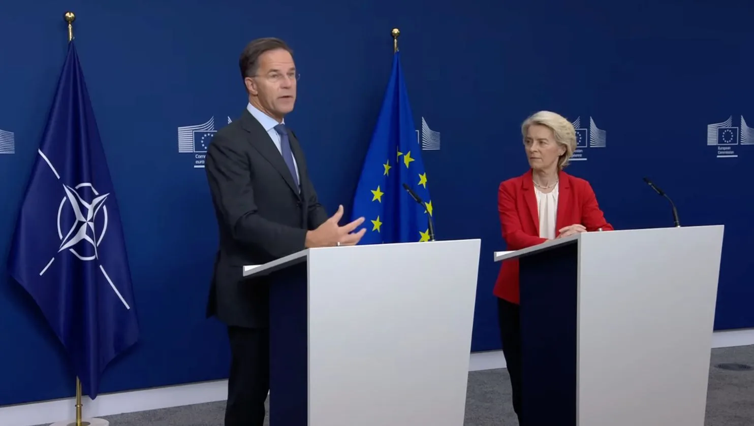 Lideri europeni discutând despre securitate și atacuri hibride.