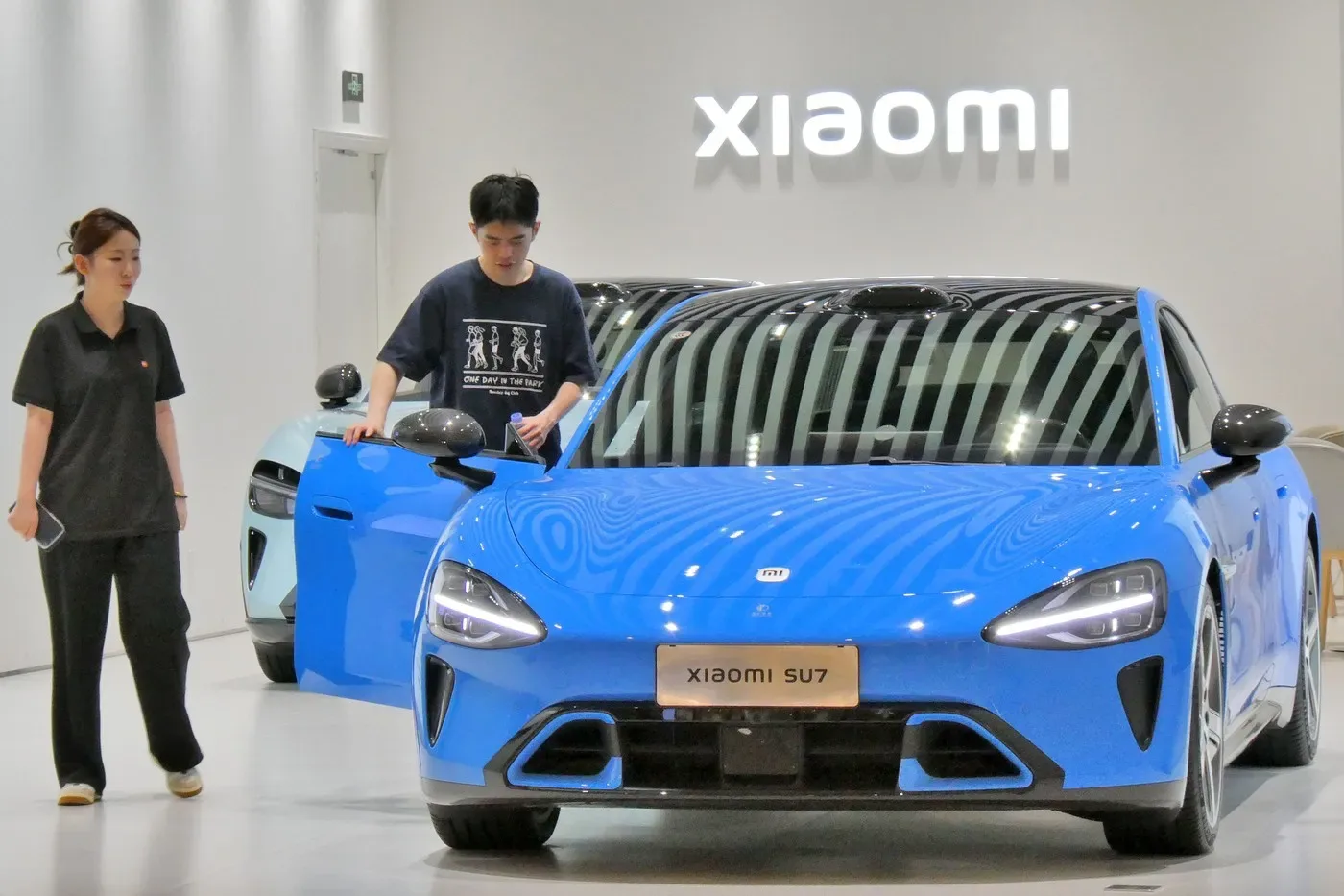 Blogger condamnat pentru informații false despre sedanul electric Xiaomi SU7.