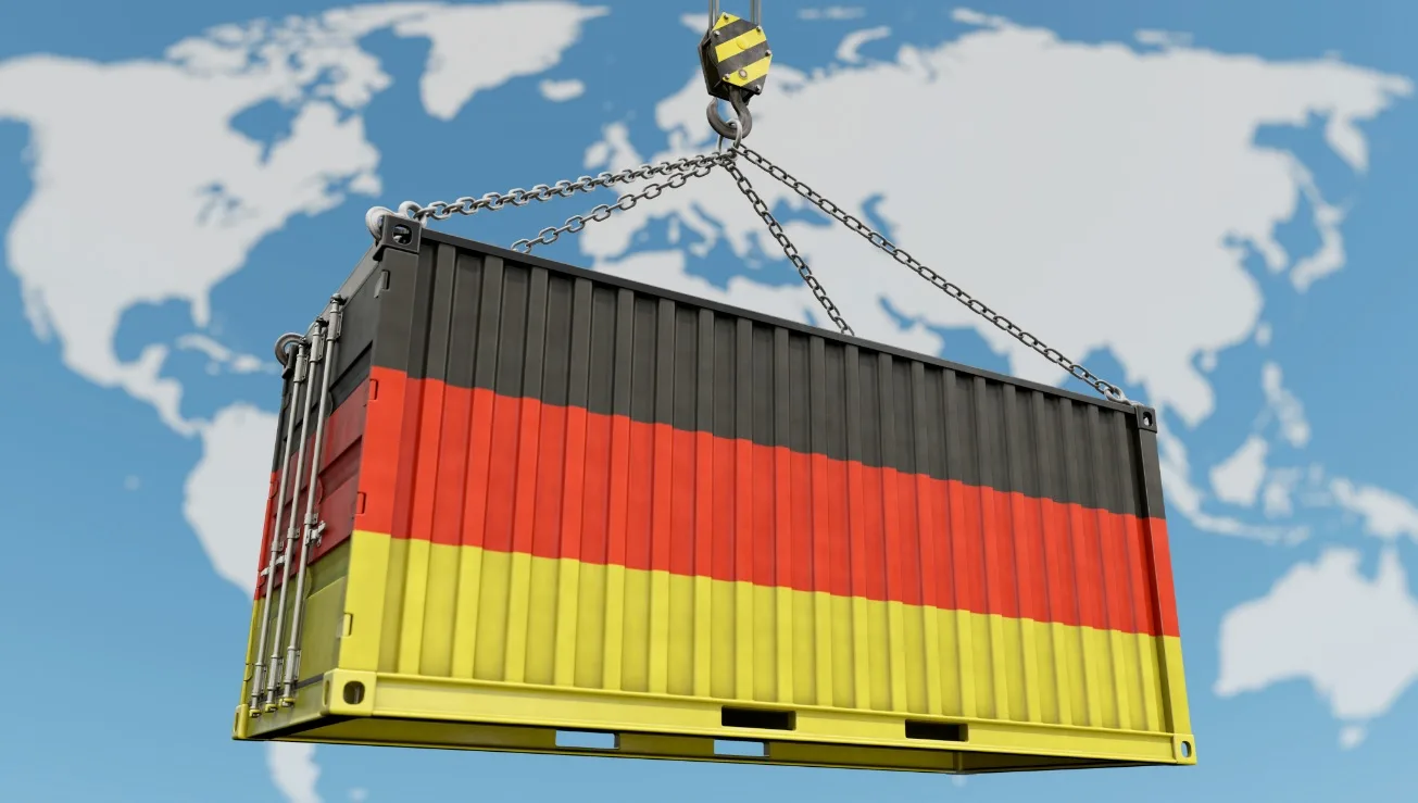 Containere de transport cu culorile Germaniei pe fundalul unei hărți mondiale.
