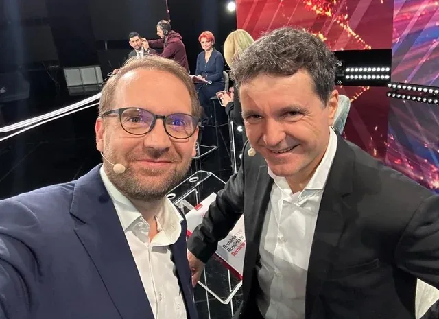 Dominic Fritz și Nicușor Dan discutând despre politica românească.