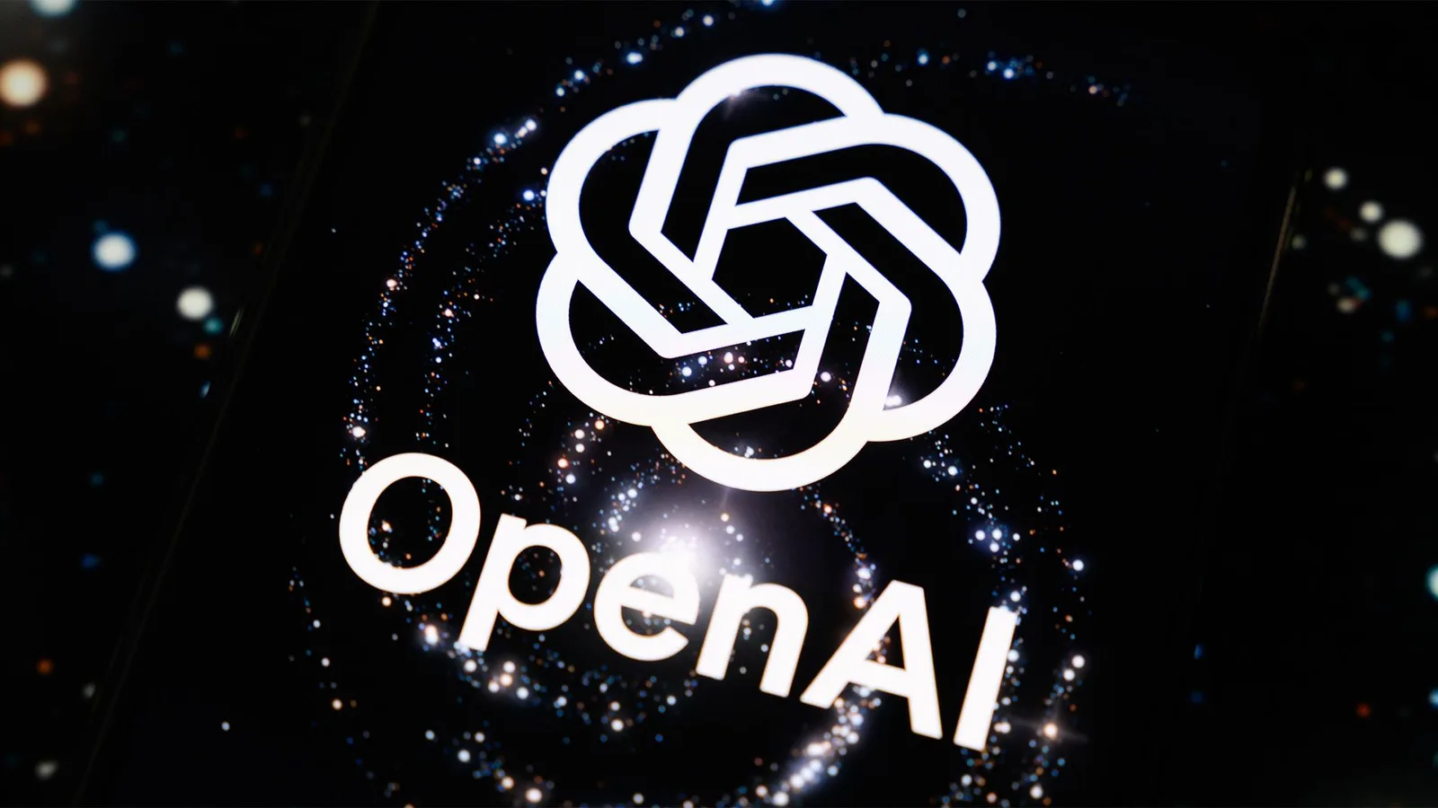 Logo OpenAI pe un fundal cosmic, simbolizând inovația în inteligența artificială.