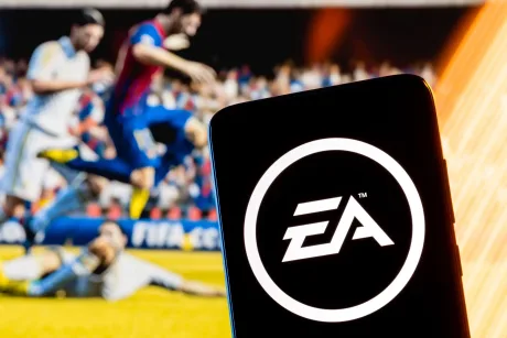 Logo-ul Electronic Arts pe un fundal dintr-un joc de fotbal.