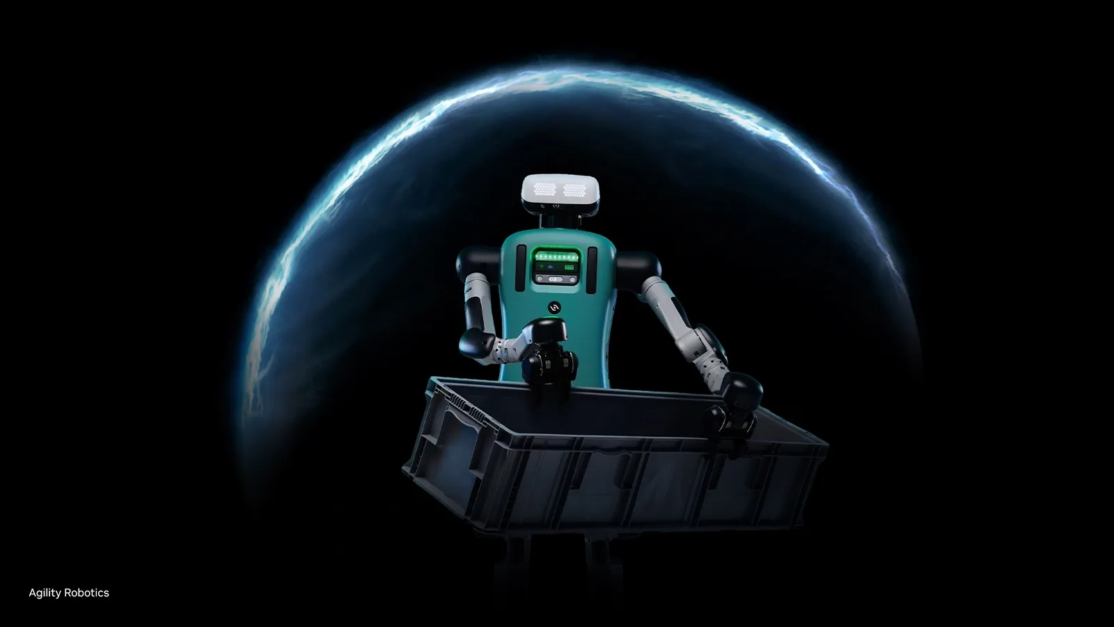 Robot humanoid cu brațe articulate, transportând un container în mediu industrial.