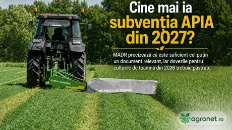 Tractor pe câmp, pregătind terenul pentru culturile agricole viitoare.