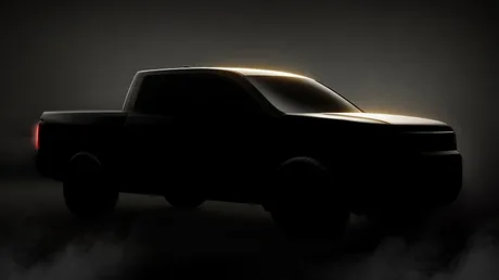 Silueta unui pickup Honda Ridgeline viitor, cu design pătrățos și linii robuste.