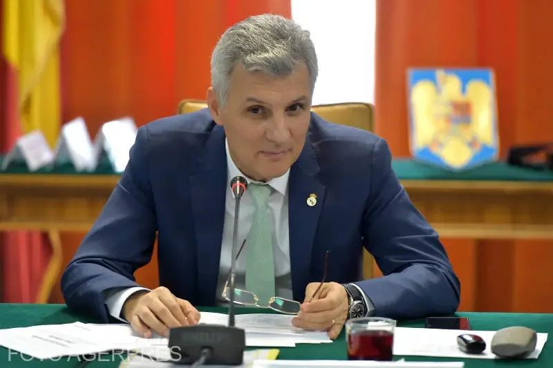 Adrian Veștea la o întâlnire oficială, discutând despre guvernare.