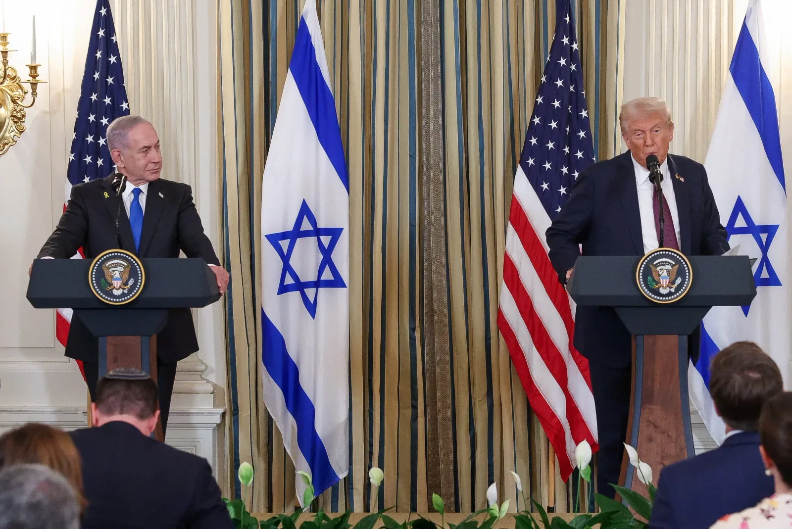 Donald Trump și Benjamin Netanyahu discutând despre acordul SUA-Iran.