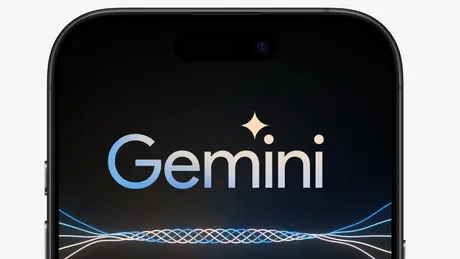 Logo-ul Gemini pe un ecran de smartphone, cu fundal întunecat și efecte luminoase.