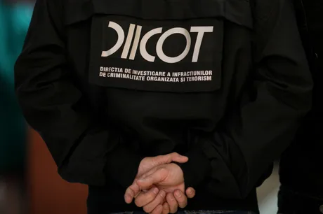 Reprezentanți DIICOT discutând despre reformele necesare în justiție.
