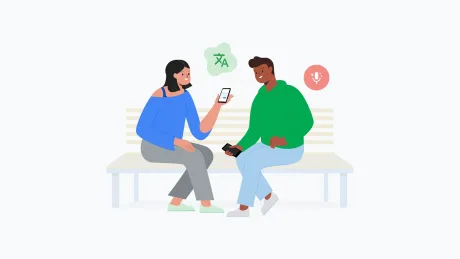 Două persoane comunică folosind un telefon mobil.