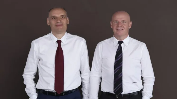 Frații Pavăl, lideri în retailul românesc, cu afaceri în expansiune.