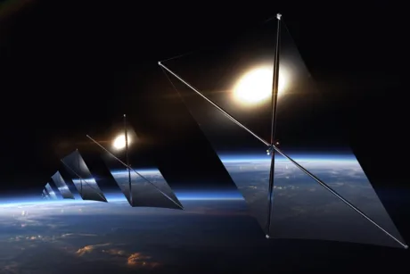 Satelitul-prototip Reflect Orbital în spațiu, cu oglinzi reflectând lumina solară.