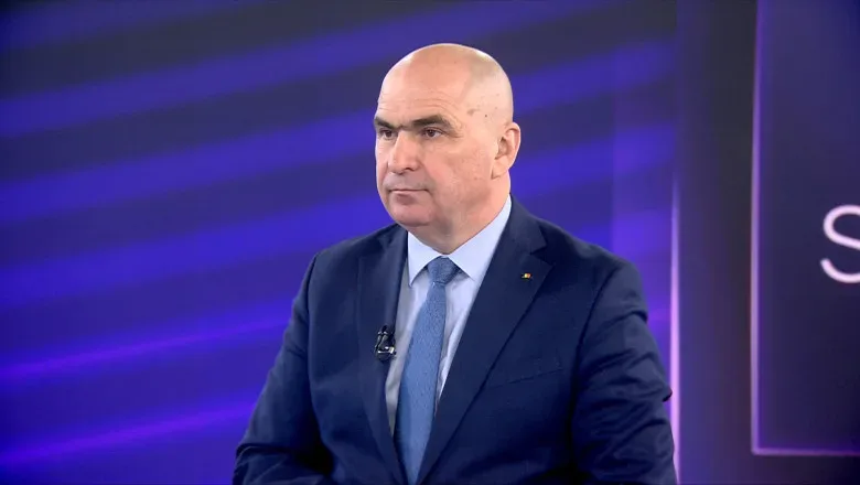 Ilie Bolojan discutând despre prețurile la carburanți.