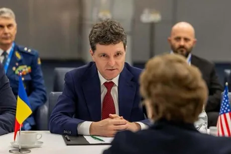 Nicușor Dan discutând despre relațiile economice și militare cu SUA la o întâlnire oficială.
