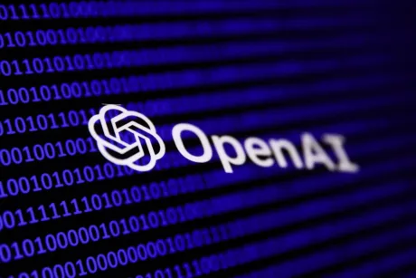 Logo-ul OpenAI pe un fundal albastru, simbolizând inovația în tehnologie.
