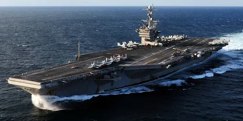 USS George Washington navighează spre Golful Persic, lăsând Pacificul fără portavion american.